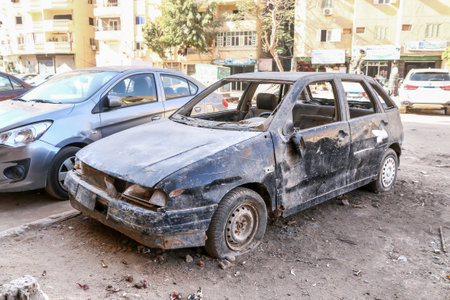 Giza, Egypt - January 26, 2021: Abandoned car SEAT Ibiza in a city street.のeditorial素材