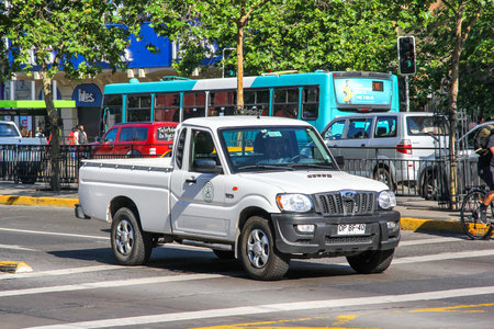 Santiago, Chile - November 13, 2015: White pickup truck Mahindra Pik-Up in a city street.