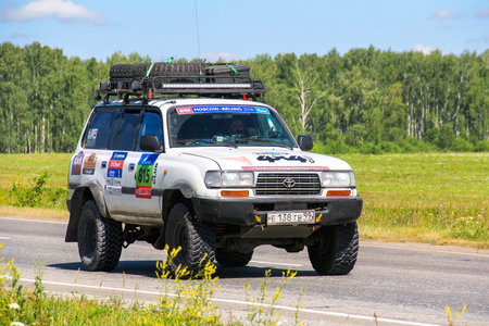 Chelyabinsk Region, Russia - July 11, 2016: White rally car Toyota Land Cruiser 80 takes part in the...