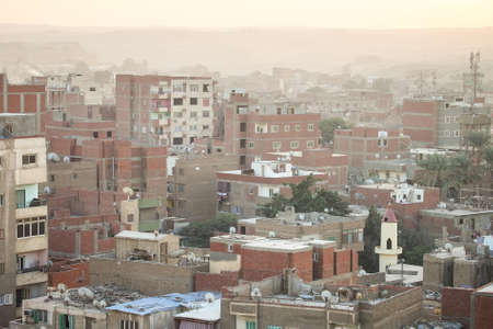 Residential quarter in Giza covered with smoke and dust in a morningの写真素材