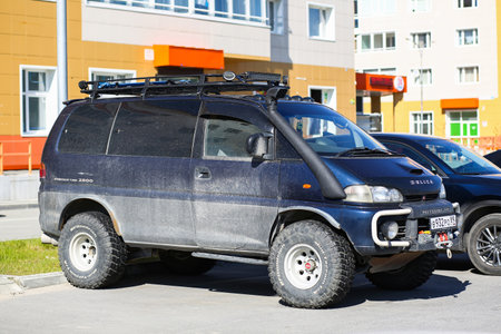 Novyy Urengoy, Russia - June 10, 2023: Offroad van Mitsubishi Delica Space Gear in the city street.のeditorial素材