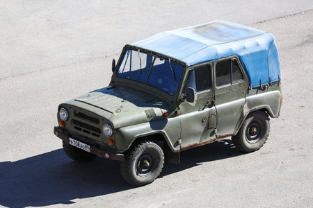 Novyy Urengoy, Russia - August 18, 2023: Old Soviet offroad car UAZ-31512 in the city street.のeditorial素材