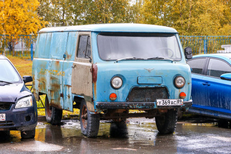 Nadym, Russia - September 4, 2022: Deserted cargo van UAZ-3741 in the city street.のeditorial素材