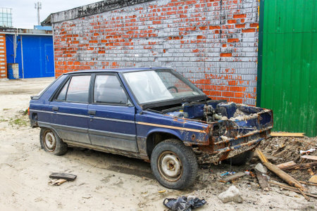 Novyy Urengoy, Russia - May 30, 2023: Old disassembled car Renault 11 in the city street.のeditorial素材