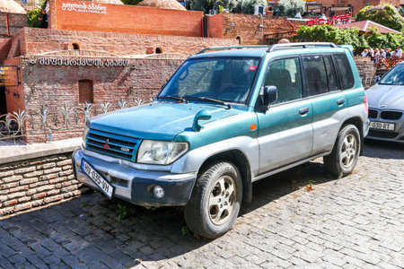 Tbilisi, Georgia - September 20, 2025: Compact SUV Mitsubishi Pajero Pinin at the city street.のeditorial素材