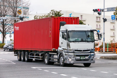 Tokyo, Japan - February 26, 2026: Semi-trailer container truck Mitsubishi Fuso Super Great at the...