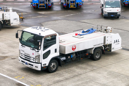 Narita, Japan - February 26, 2026: Aircraft lavatory service truck Isuzu Forward in the Narita...