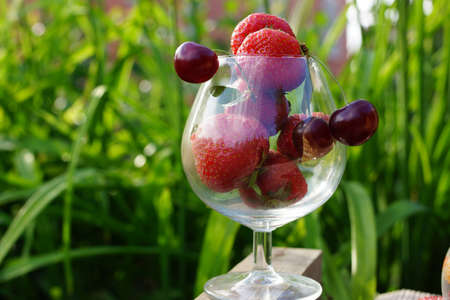 Sweet summer berries  strawberries, cherry, currant, raspberryの写真素材
