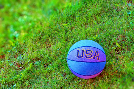 Ball with sign USA on the lawn  