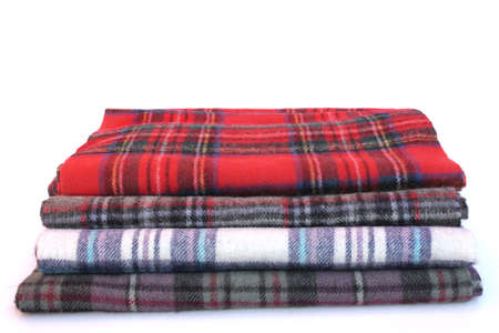 Tartan scarves with fringe. Different styles of color plaid scarves isolated on white background.