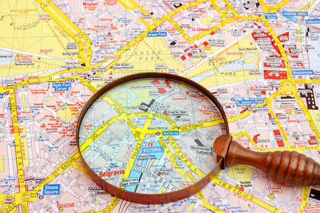 Map of London and magnifier glass. Palace Victoria Close-up.のeditorial素材