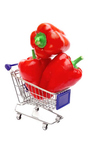 Three Bell Peppers in shopping  cart isolated on white backgroundの写真素材