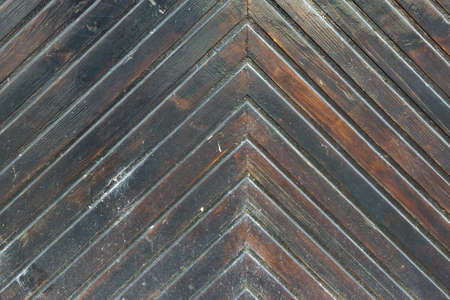 Old Wooden Gate Detail with Herringbone Patternの写真素材