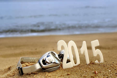 2015 New Year numbers on the sea beach. Background and Texture for text or image