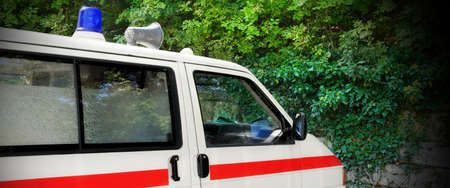 Detail of Old German Ambulance Car Parking at Stone Wall