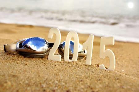 2015 New Year numbers on the sea beach. Background and Texture for text or image