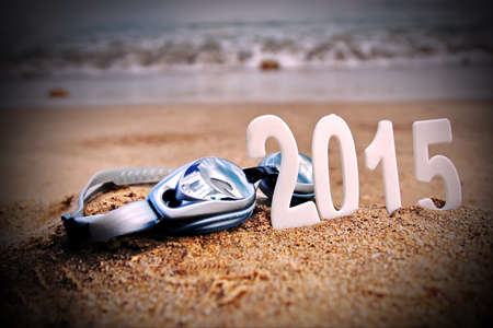 2015 New Year numbers on the sea beach. Background and Texture for text or image