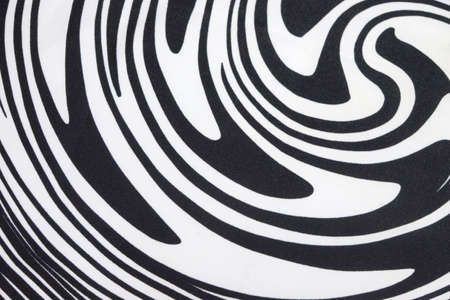 Black and White Textured Fabric with  Swirl or Zebra Pattern Backgroundの写真素材