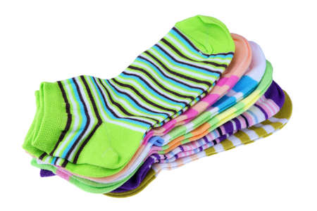 Stack Of Many Pairs of Colorful Striped Socks isolated On White Backgroundの写真素材