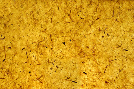 Yellow Orange Gold Amber Citrine Color Mulberry Handmade Paper Background Or Texture Close-upの写真素材