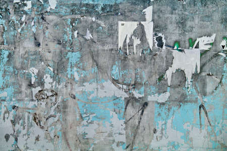 Old Billboard With Torn Posters And Ads  Background Texture Closeup