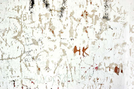 Scratched By Vandals Old Whitewashed Walls With Many Signs Background Textureの写真素材