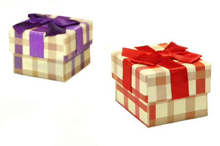 Two Checkered Gift Box With  Beige Brown Pattern, Red Violet Ribbon And Bow, Isolated On White Background,  Horizontal Image, Close Up, Front Viewの写真素材