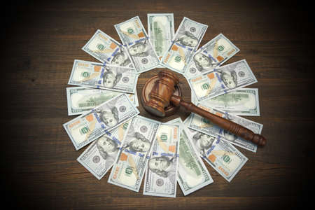 Judges Or Auctioneers Gavel And American Dollar Cash On Rough Wood Table Background, Overhead View,...