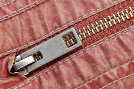 Zippered Red Leather Pocket With Metal Fastener, Close-upの写真素材