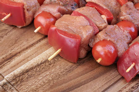 Uncooked Marinated And Rubbed Shish Kebabs From Pork Tenderloin On Skewers Ready For Grilling In BBQの写真素材