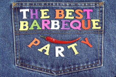 Barbecue Party Wood Sign On Blue Jeans Apron Backgroundの写真素材