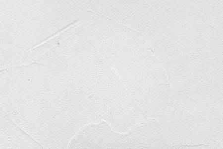 Brick Wall Fragment With Decorative White Finishing Plaster And  Abstract Application Pattern Textured Backgroundの写真素材