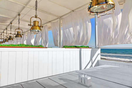 Seaview Restaurant Interior. White Terrace Or Veranda With Separated Cabins Under Tent And White...