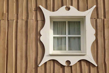 Wooden Overlapped Boarded Wall Background With Single Window And Carved White Plat Bandの写真素材