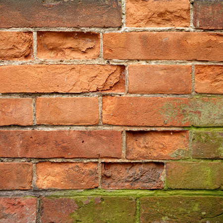 Shabby Uneven Brickwall Frame Background. Grungy Stone Wall Rectangular Surface. Old Red Brown Brick...