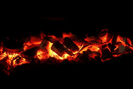BBQ Grill Pit With Glowing And Flaming Hot Charcoal. Hot Charcoal In Barbecue Grill Pit With Flames...