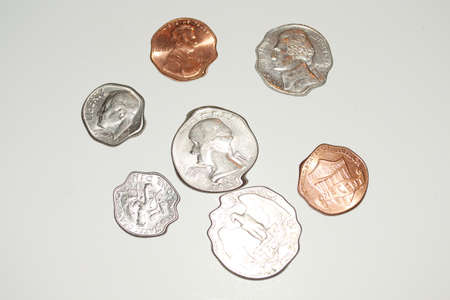 Coins in the water, wavy coinsの写真素材
