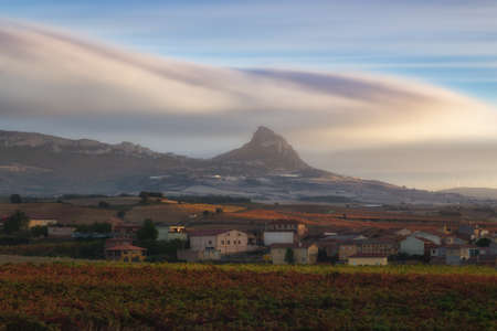 Lapoblacion peak over Elvillar village in Alavaの写真素材