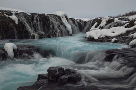 Inside Bruearfoss blue waterfall in Icelandの写真素材