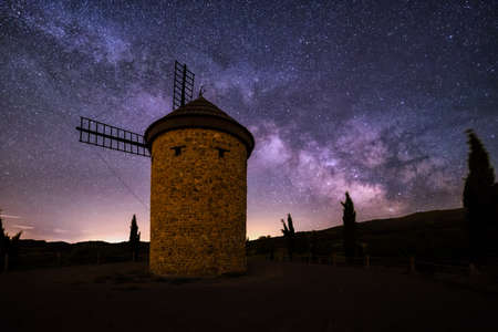 Milky Way over Molino de Ocon windmill in La Rioja, Spainの写真素材