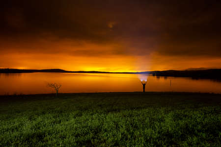 Luminic pollution from Vitoria at night in Ullibarri-Gamboaの写真素材