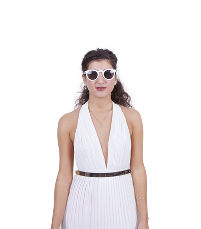 Attractive young woman wearing sunglasses isolated over white backgroundの写真素材