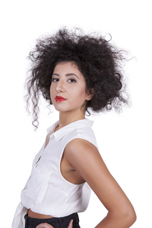 Side view of a gorgeous young female against white backgroundの写真素材