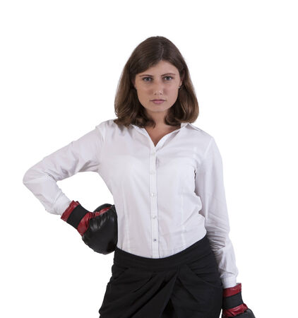 Portrait of a young woman wearing boxing glovesの写真素材