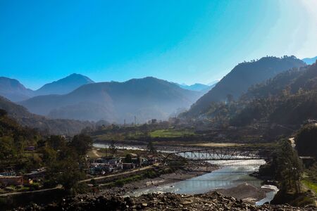Amazing mountain lake bridge over waterの写真素材