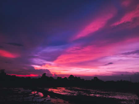 Beautiful sunset in the countryside of Thailand. Colorful sky.の写真素材