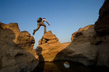 trekking in the rock with backpack