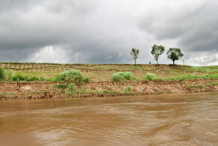 Eroded cut bank of Mae Khong river, Thailandの写真素材