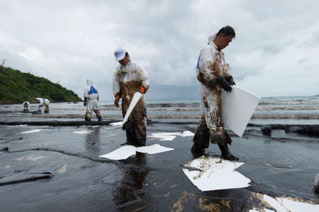 crude oil on oil spill accident on Ao Prao Beach at Samet island on July 31,2013 in Rayong,Thailand