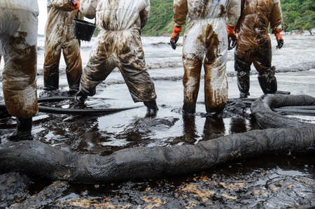 crude oil on oil spill accident on Ao Prao Beach at Samet island on July 31,2013 in Rayong,Thailandのeditorial素材